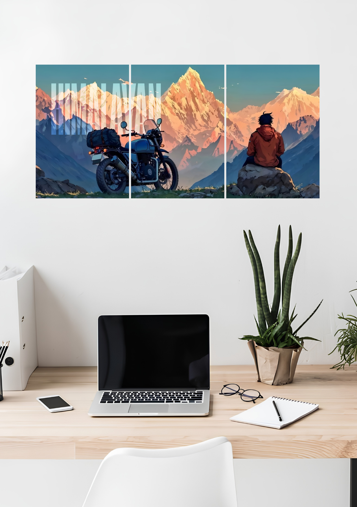A classic motorcycle and a lone rider looking at snowy peaks at sunset, across three panels, 3 piece split poster above a desk