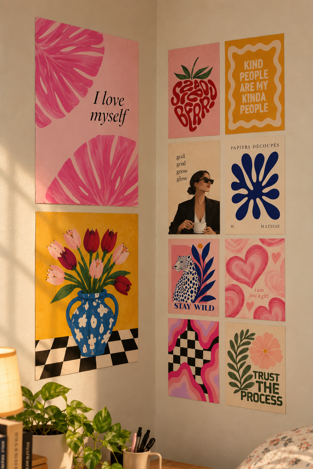 Pink aesthetic gallery wall of 10 posters with tulips, a leopard, hearts and affirmation prints, wall poster pack in a styled room