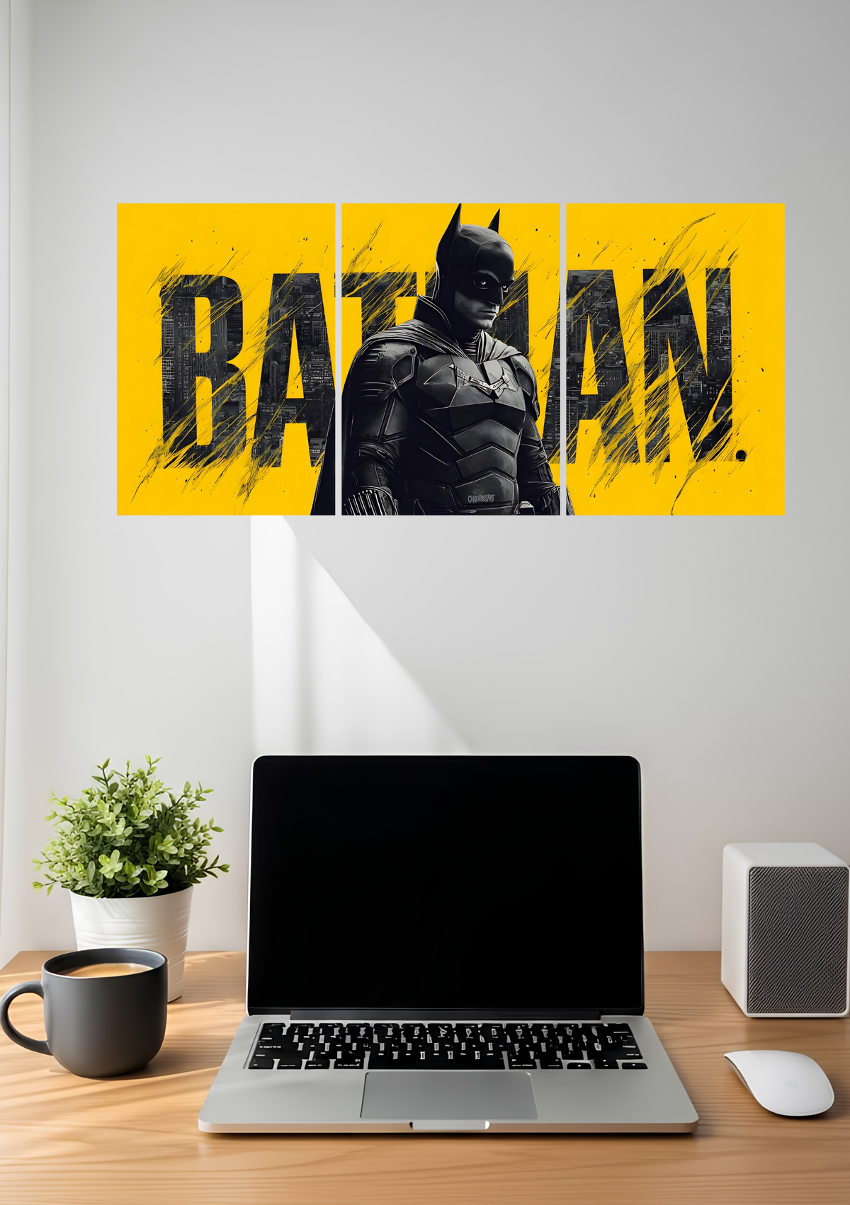 A dark masked vigilante in front of bold black lettering on bright yellow, across three panels, 3 piece split poster above a desk